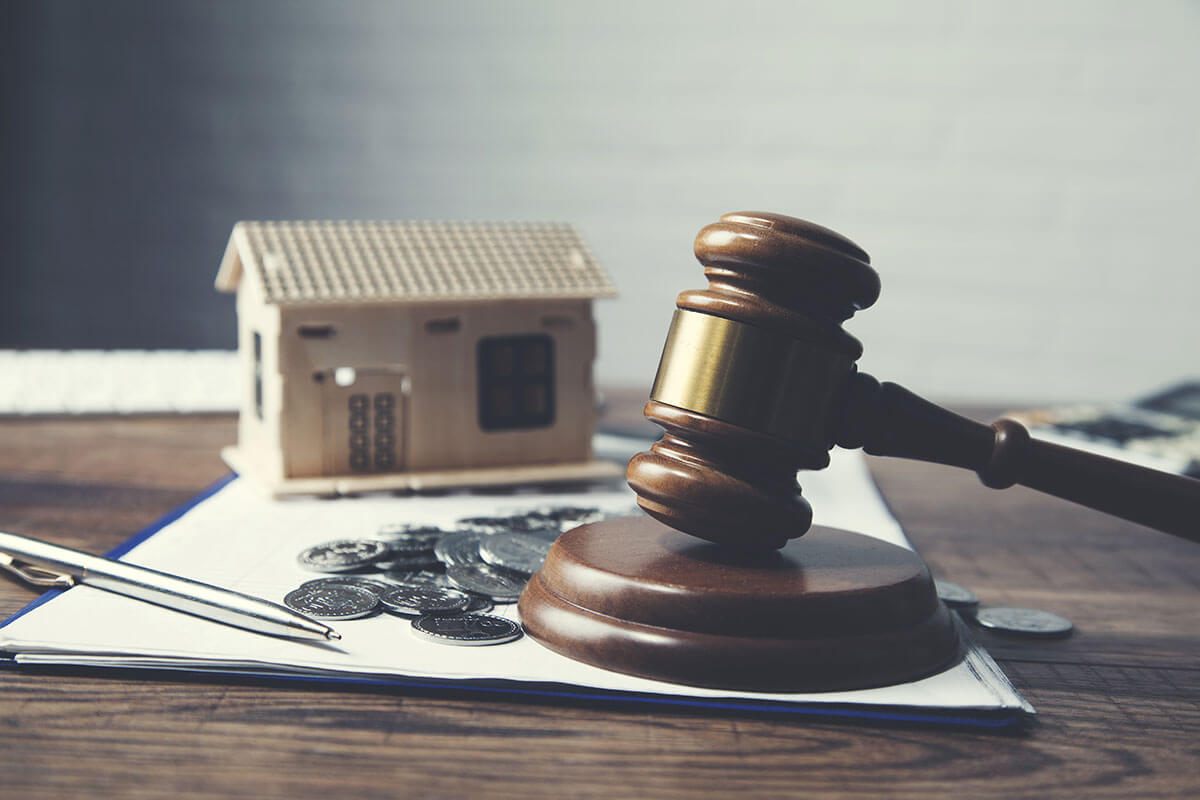 Secure your investment by working with a real estate lawyer to buy or sell a house.